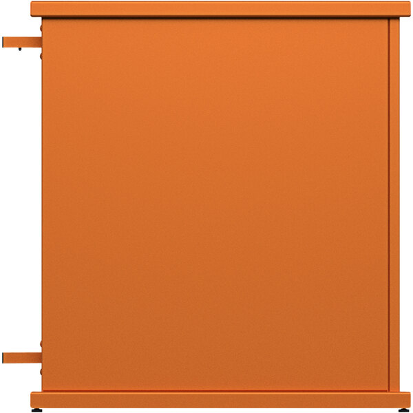 An orange metal planter with a rectangle cut-out on top.