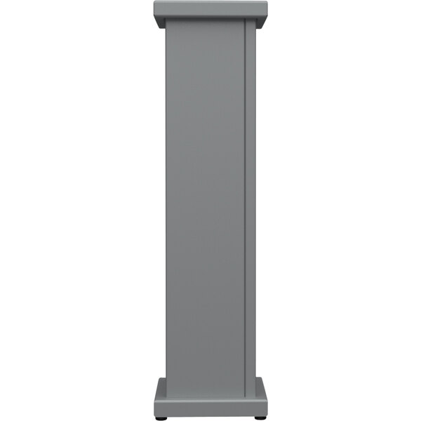 A gray rectangular pedestal with a square top cut out.