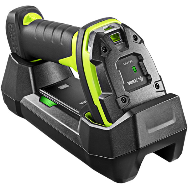 A Zebra barcode scanner with a black and green rechargeable battery and standard cradle.
