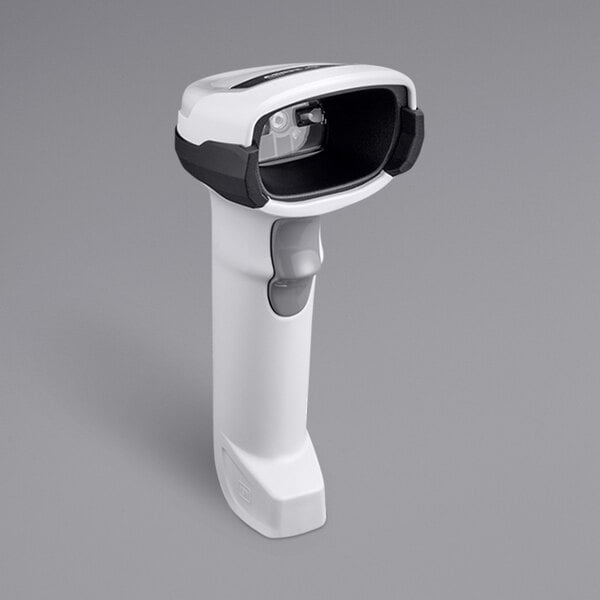 A close-up of a white Zebra DS2278 handheld barcode scanner.