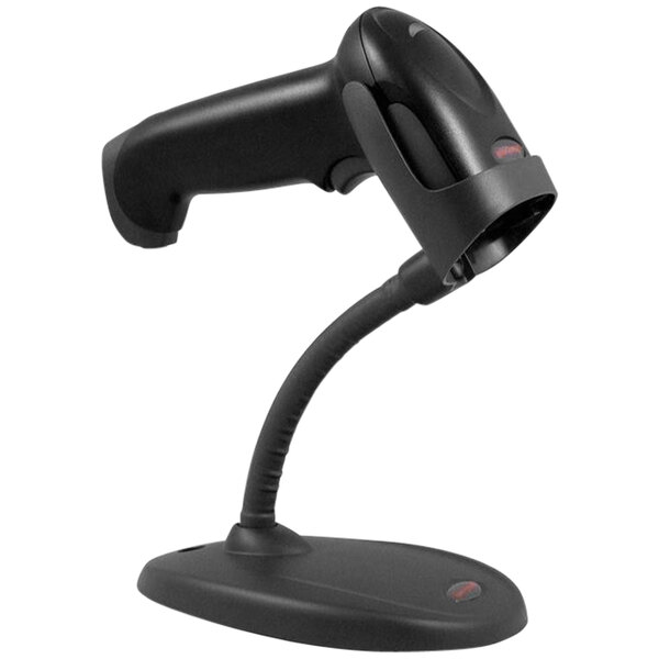 A black Honeywell barcode scanner on a stand.