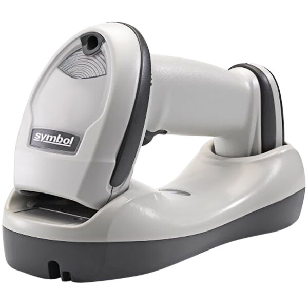 A white Zebra LI4278 barcode scanner with attached cord in a standard cradle.