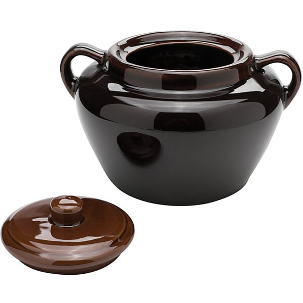 A brown ceramic pot with a lid.