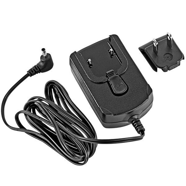 A Zebra power supply wall adapter with a black cord and plug.