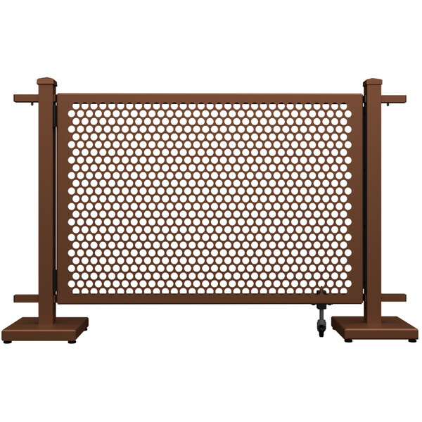 A brown metal fence with a circle pattern.