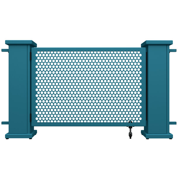A teal metal gate with a white circle pattern.