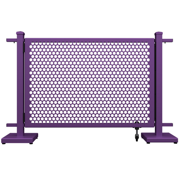 A purple metal fence with white circle patterns.