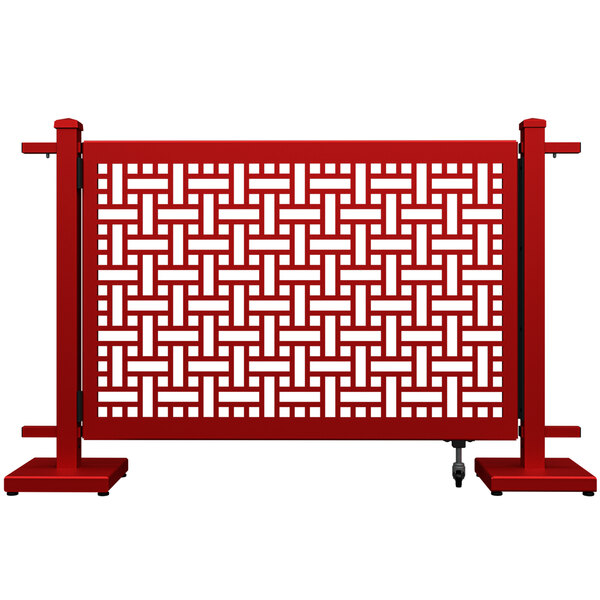A red gate with a square weave pattern.