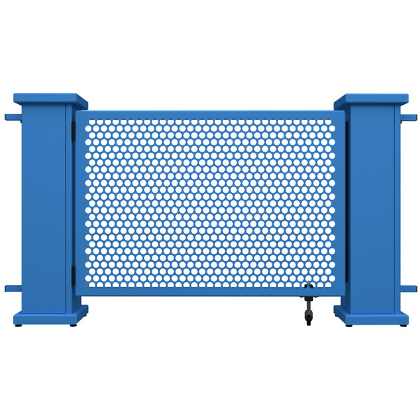 A blue metal gate with a white circle pattern and planter stands.