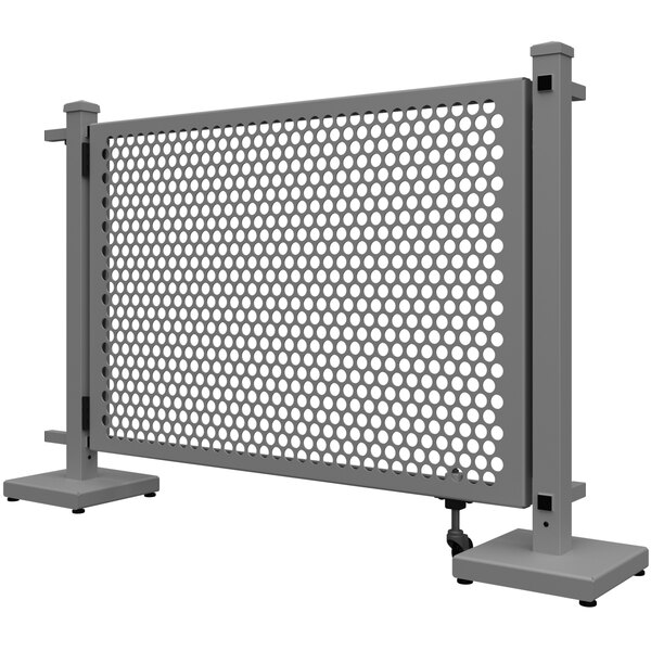 A SelectSpace gray metal gate with a circle pattern and stands.