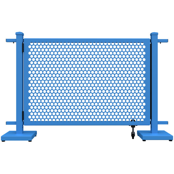 A sky blue metal gate with a circle pattern.
