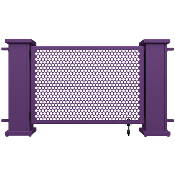 A purple metal fence with white circle patterns on the gate and planter stands.