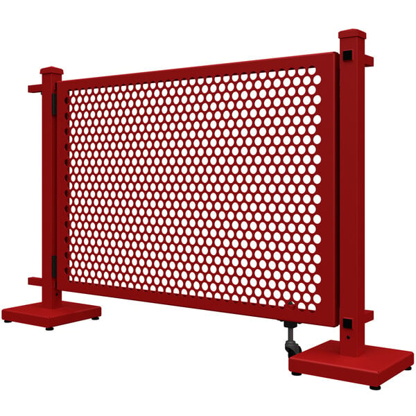 A red metal SelectSpace gate with circle pattern and corner stands.