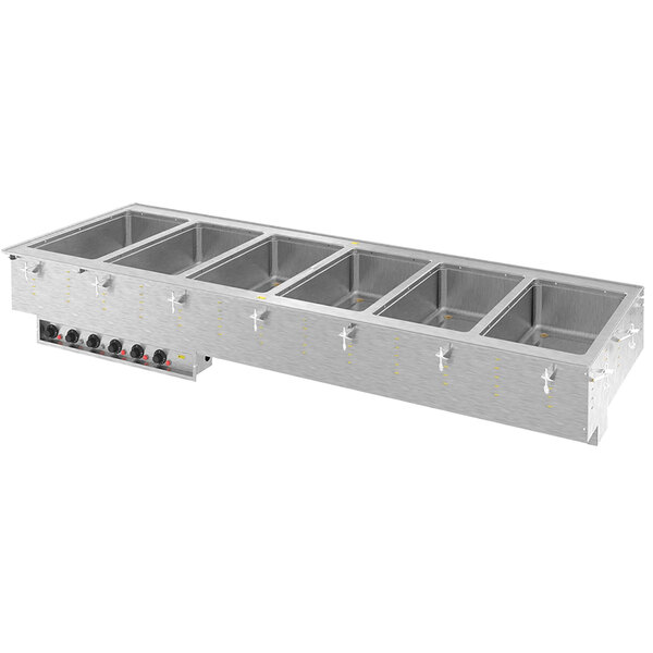 A Vollrath stainless steel drop-in hot food well with six compartments on a counter.