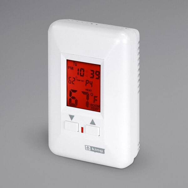 A white programmable King Electric thermostat with a red digital screen.