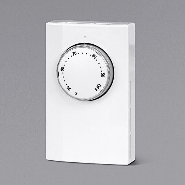 A white rectangular King Electric double pole thermostat with a white dial and black numbers.