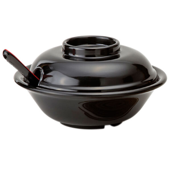 A black GET Fuji bowl with a lid and spoon in it.