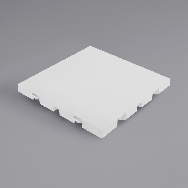 A white square EverBase flooring tile with a solid top.