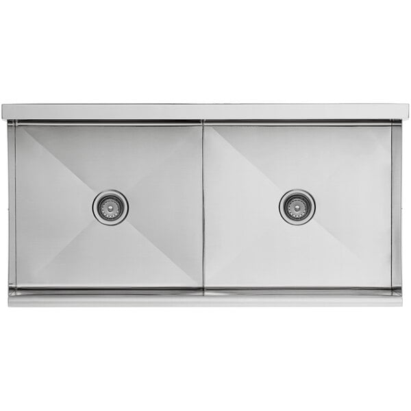 A close-up of a Regency stainless steel utility sink with two compartments.