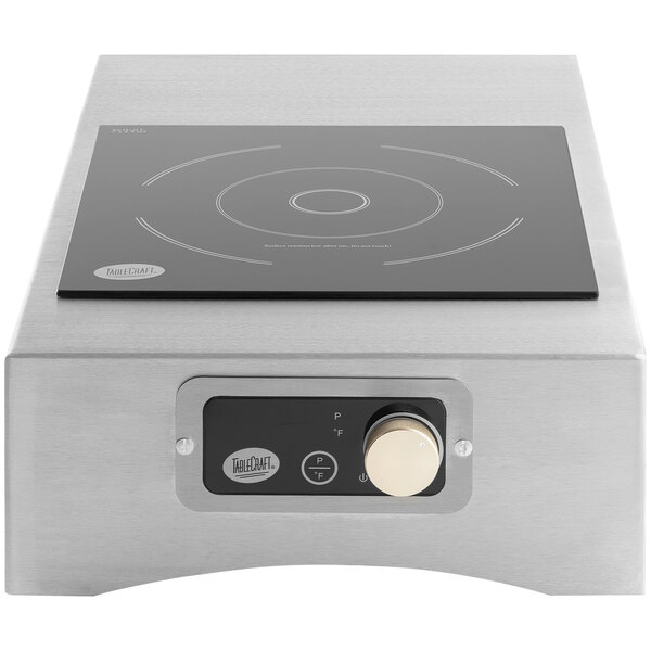 A silver brushed aluminum Tablecraft induction station with a black surface.