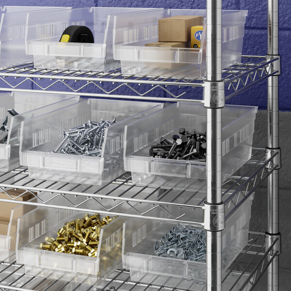 Clear plastic bins filled with various hardware items are organized on metal wire shelving.