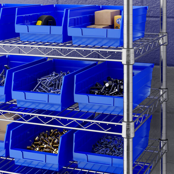 Blue plastic bins filled with various hardware items are organized on metal wire shelving.