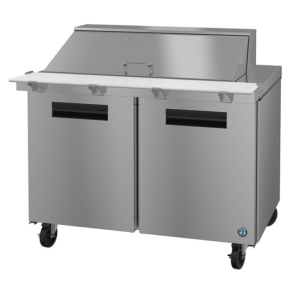 A Hoshizaki stainless steel refrigerated sandwich prep table with two doors.