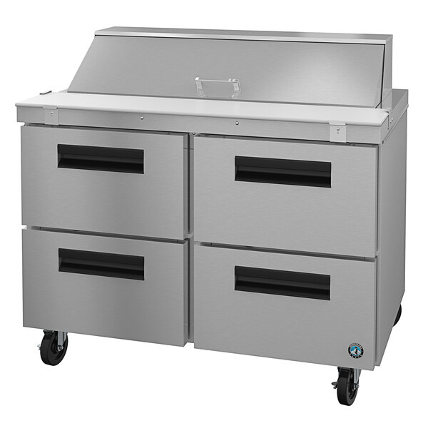 A large stainless steel Hoshizaki refrigerated sandwich prep table with drawers.