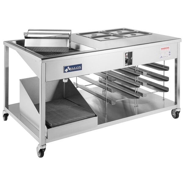 A stainless steel heated combination icing and glazing table by Avalon Manufacturing.