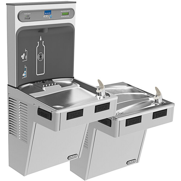 An Elkay stainless steel bi-level water fountain with a bottle filling station and a drink dispenser.
