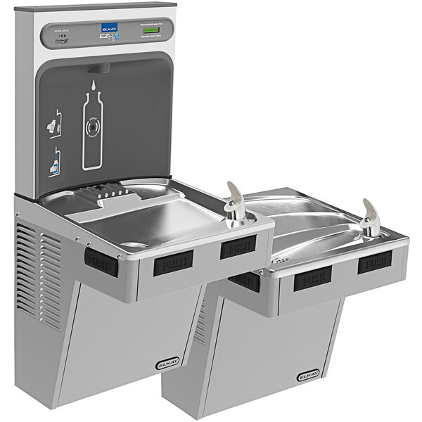 An Elkay light gray bi-level water fountain with a bottle filling station and drinking fountain.