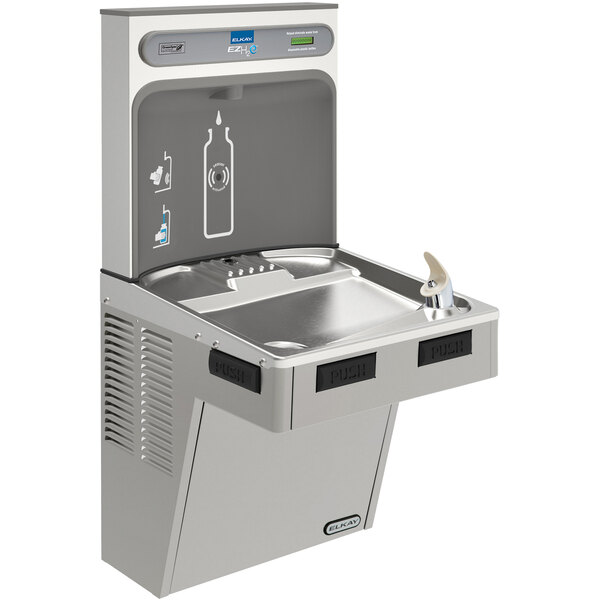 An Elkay light gray non-filtered bottle filling station on a counter with a bottle filling up.
