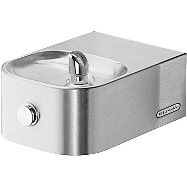 An Elkay stainless steel wall mount drinking fountain with a round button.