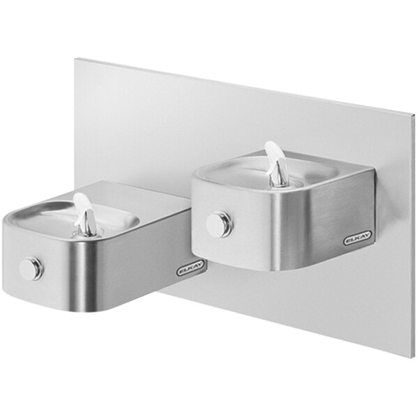 An Elkay stainless steel reverse bi-level wall mount drinking fountain with two dispensers.