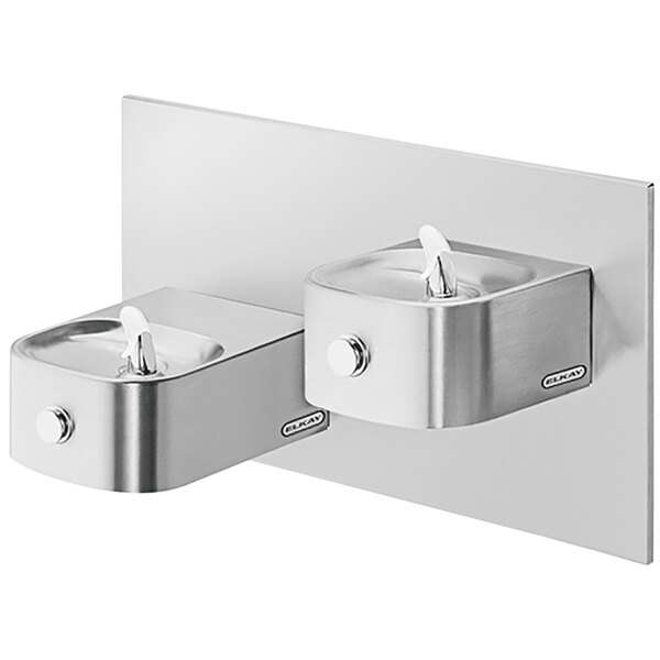 Elkay stainless steel wall mounted reverse bi-level water fountain with faucets.