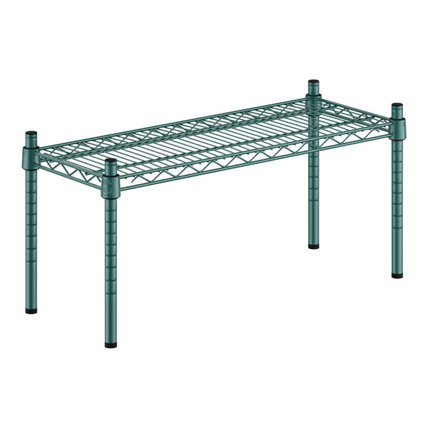 A green metal shelf with black legs.