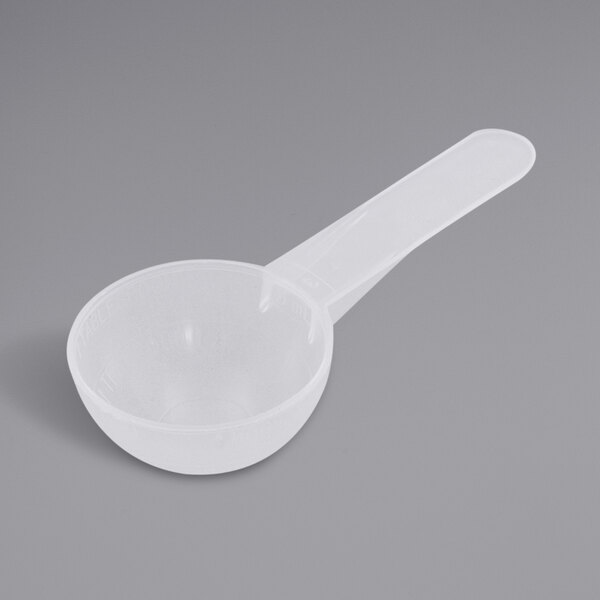 A white plastic bowl scoop with a long handle.
