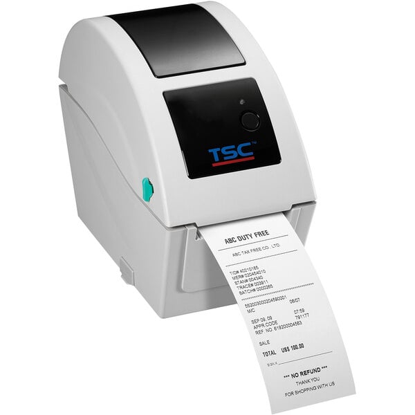 A white TSC TDP-225 label printer with a label in it.