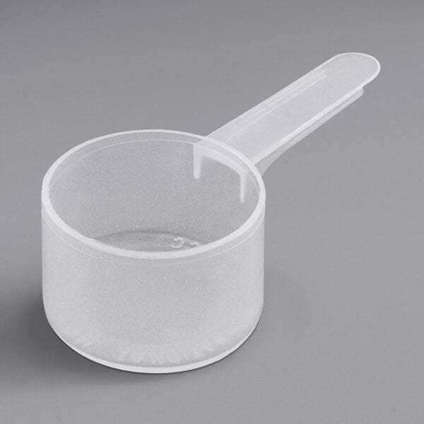 A clear plastic polypropylene scoop with a medium handle.