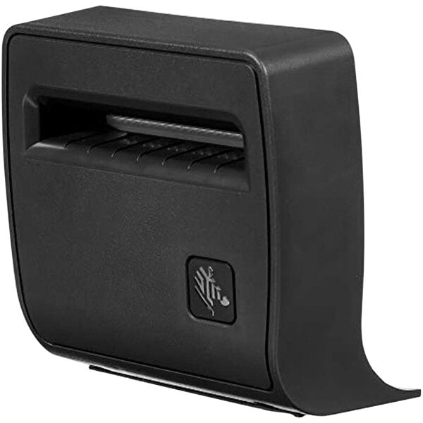 A black rectangular object with a small black button.