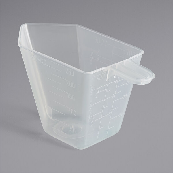 A 5 oz. clear plastic Polypropylene scoop cup with a handle.