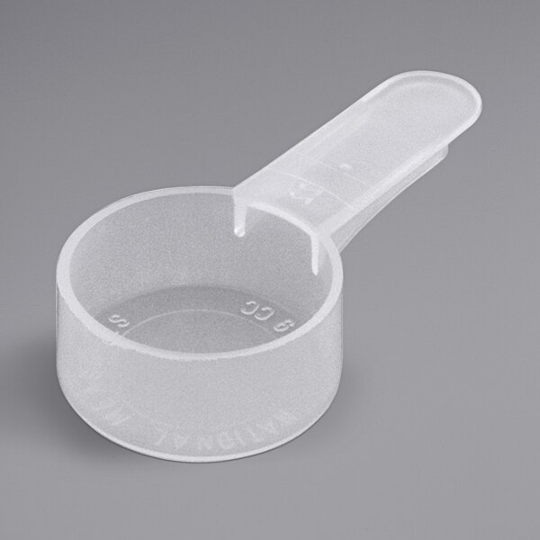 A close-up of a 9 cc Polypropylene plastic scoop with a short handle.