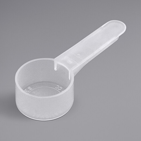 A white plastic 9 cc Polypropylene scoop with a medium handle.