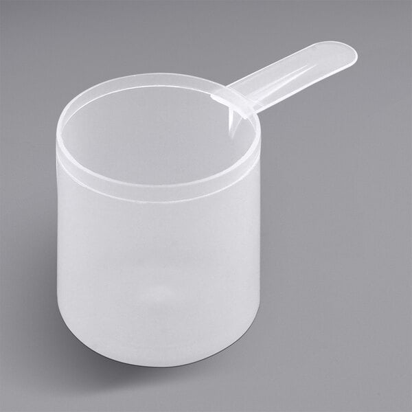 A clear plastic container with a white polypropylene scoop on top.