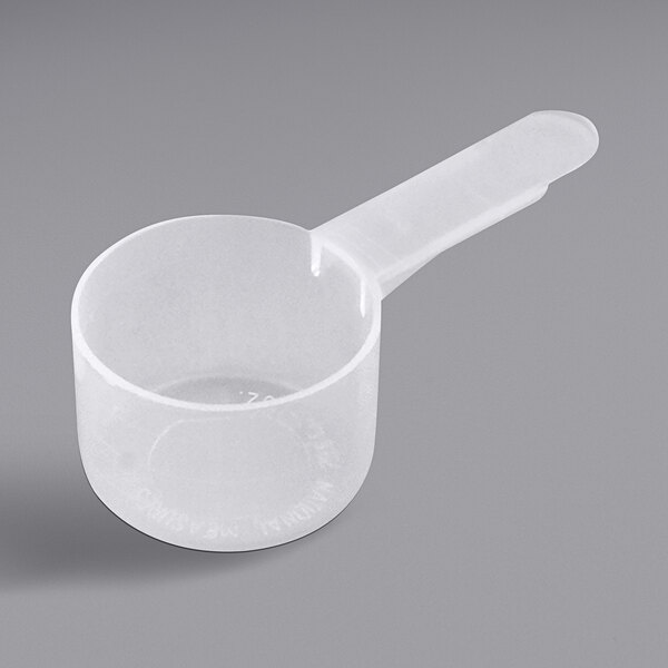 A white plastic 29.6 cc Polypropylene scoop with a medium handle.