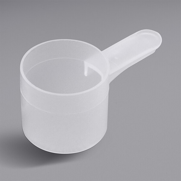 A white plastic scoop with a short handle.