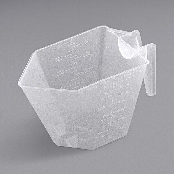 A case of 250 white plastic 16 oz. polypropylene measuring cups with handles.