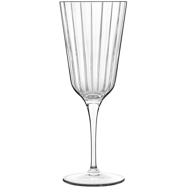 A clear Luigi Bormioli Bach cocktail glass with a thin stem.