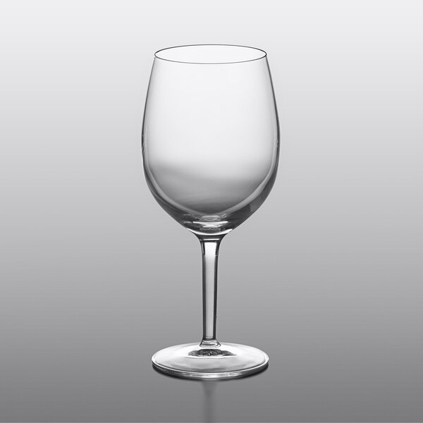 A close-up of a clear Luigi Bormioli Rubino Bordeaux wine glass.