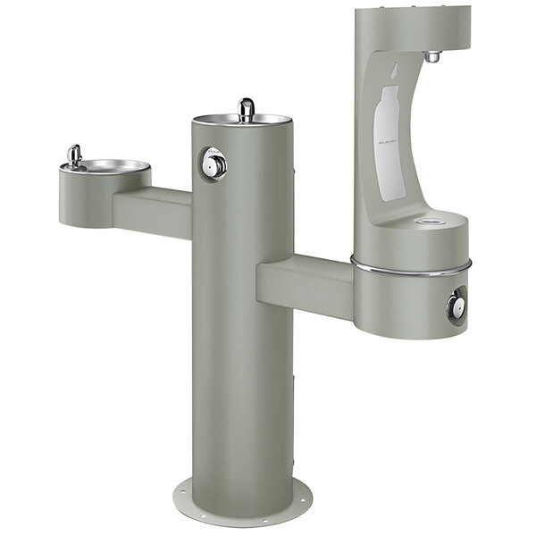 An Elkay gray outdoor tri-level pedestal drinking fountain with two faucets.